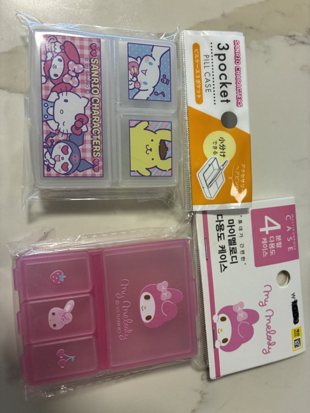 Two kiddy medication containers - Hello Kitty & My Melody NWT
